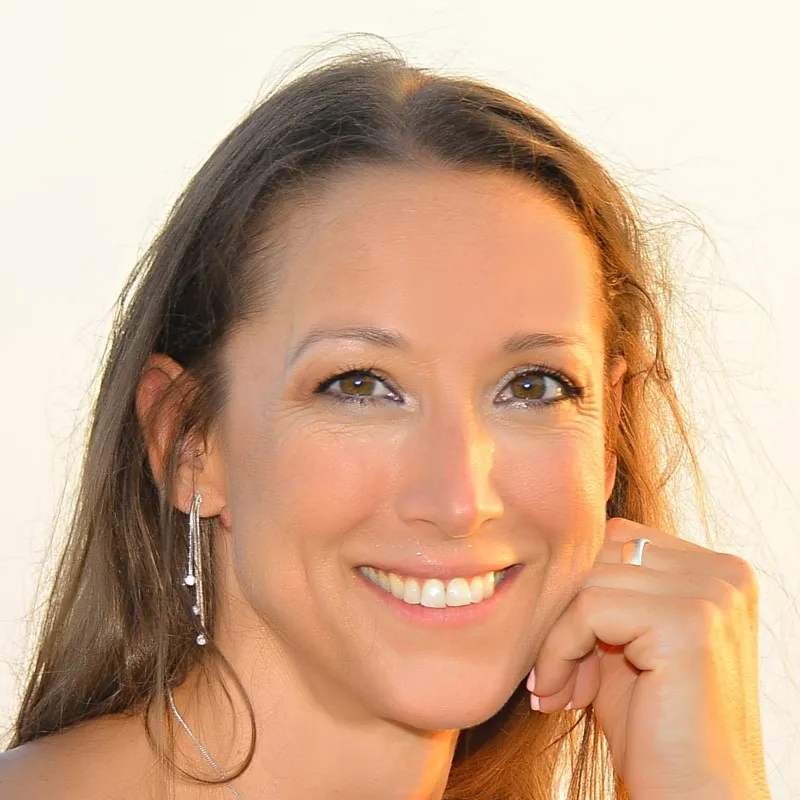 Kate Horsington, smiling, in warm evening light